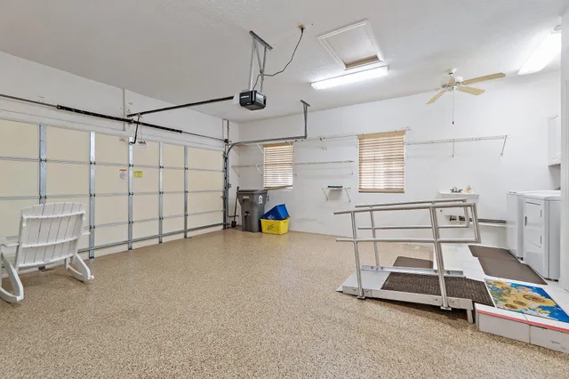 a room with gym equipment and white walls