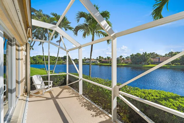 a view of swimming pool with seating area