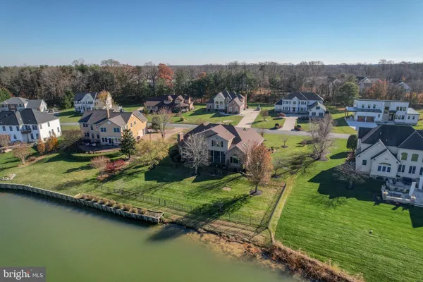 a view of a town with mountains in the background