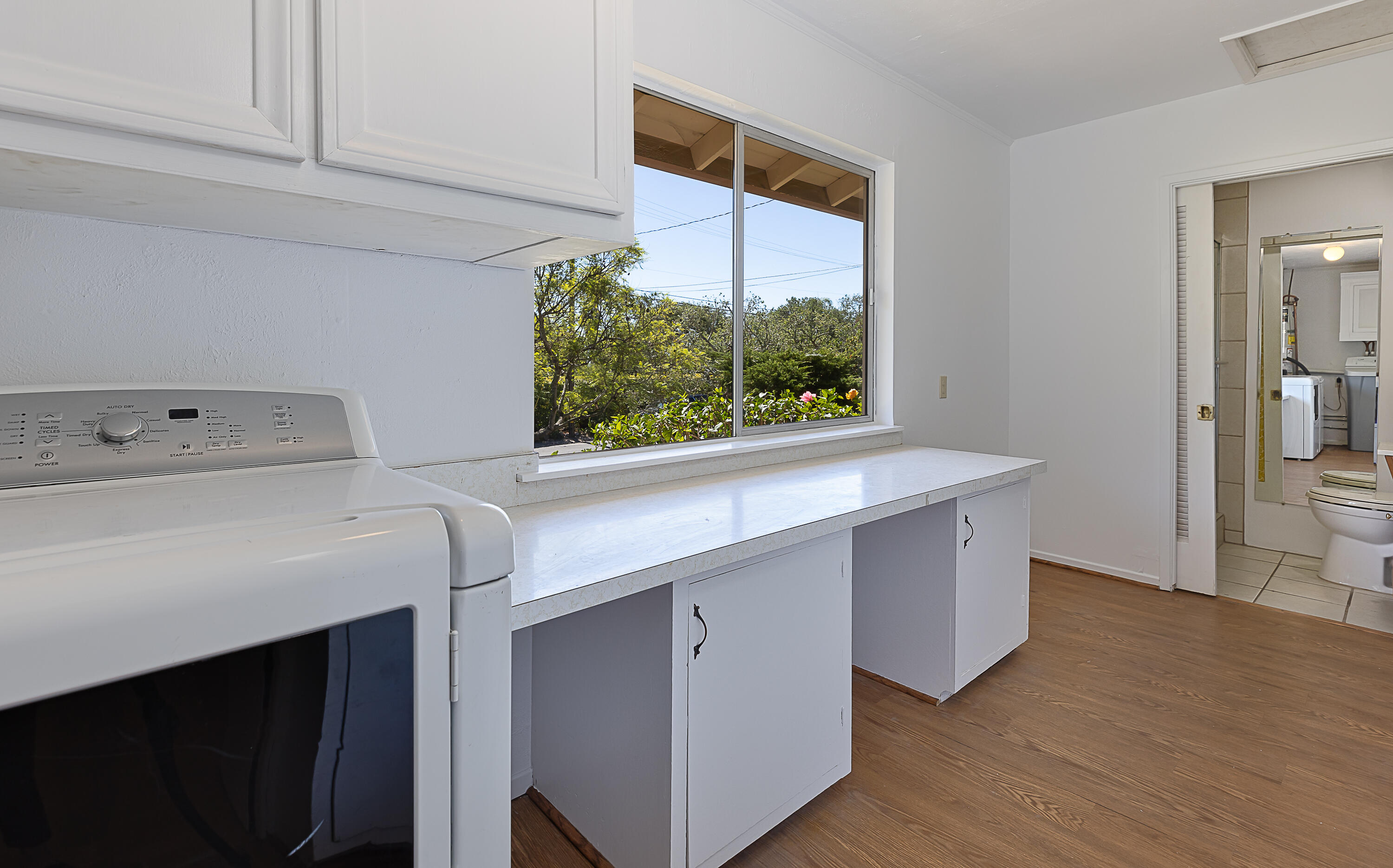 317 Alston Road Santa Barbara, CA 93108 - Photo 15 of 20 a kitchen with a sink cabinets and a window