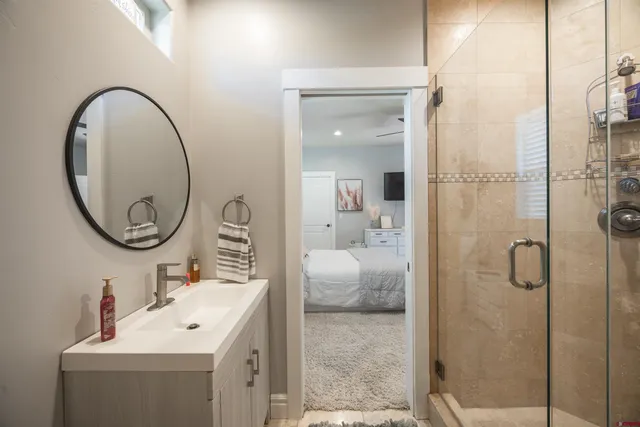 a bathroom with a sink and a mirror