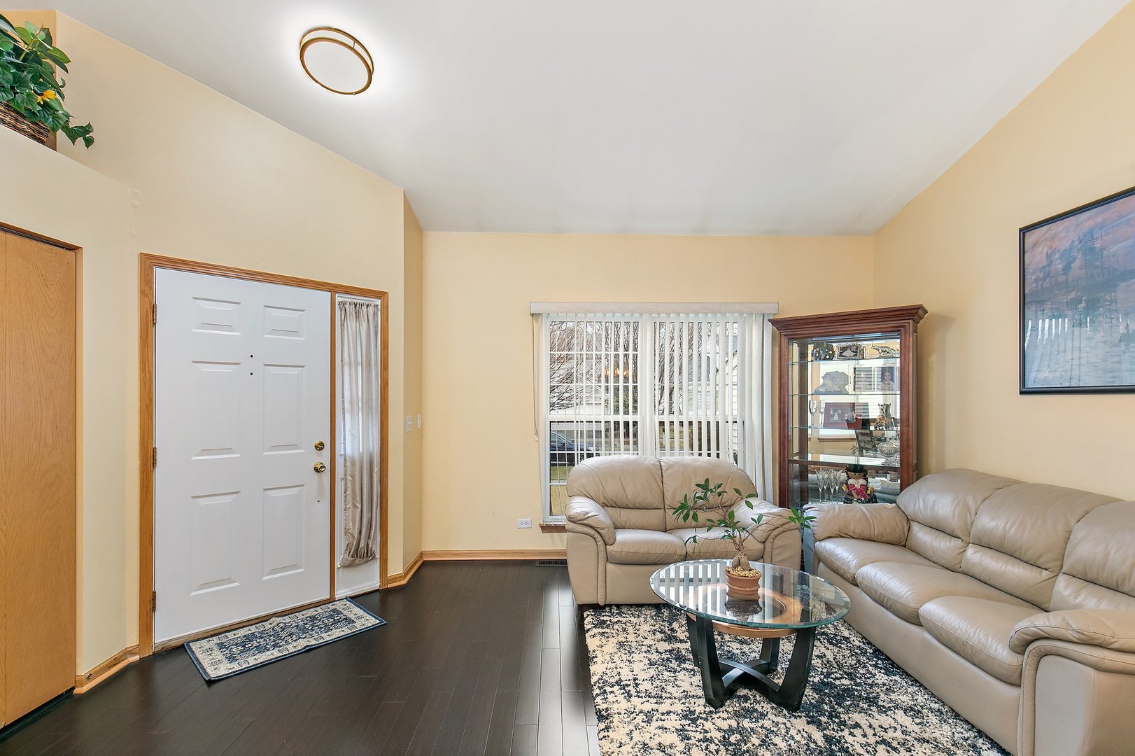 25649 Brooks Farm Road Round Lake, IL 60073 - Photo 4 of 24 a living room with furniture and a large window