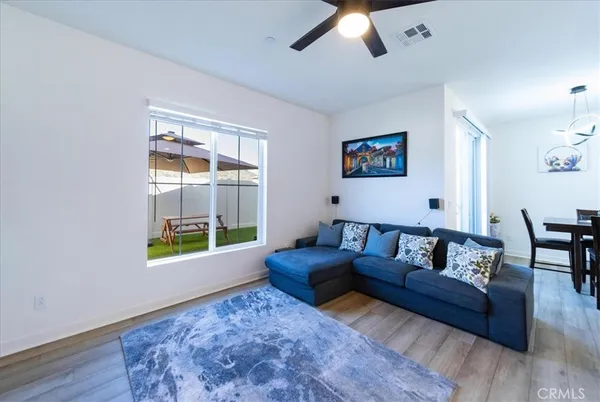 an aerial view of houses with an outdoor space