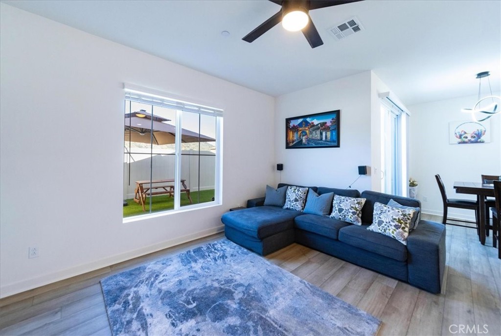 35246 Blossom Place Fallbrook, CA 92028 - Photo 19 of 62 a living room with furniture and a window