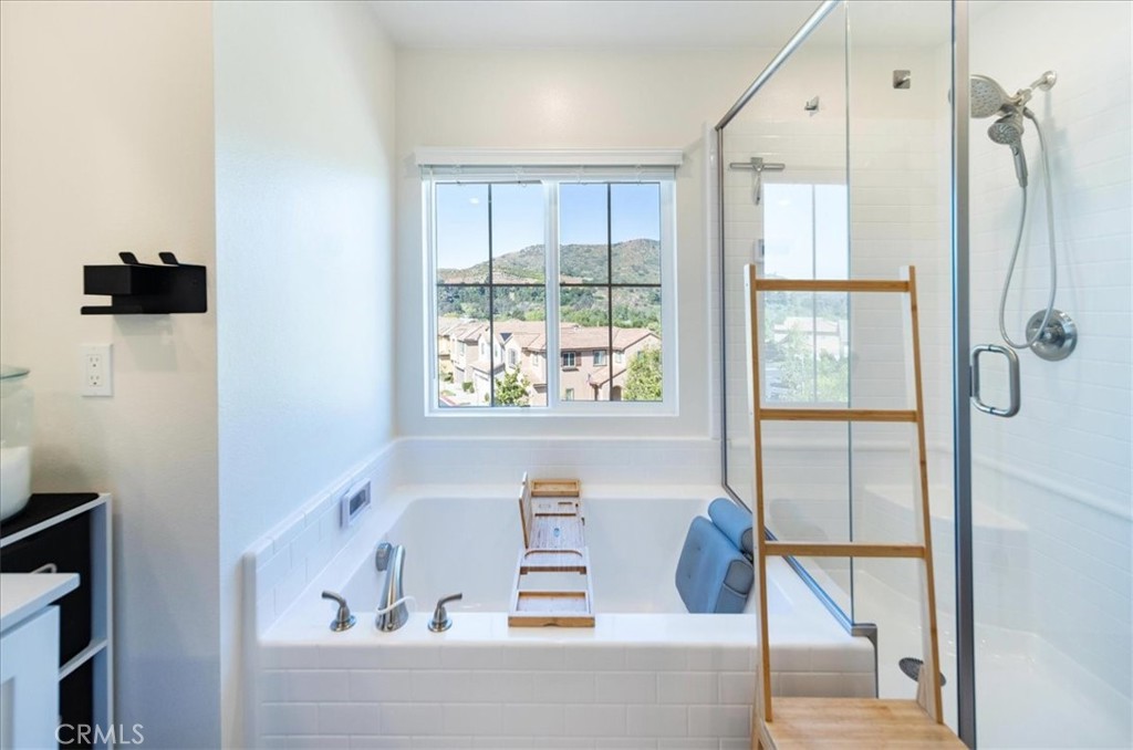 35246 Blossom Place Fallbrook, CA 92028 - Photo 41 of 62 a bathroom with a bathtub and a shower