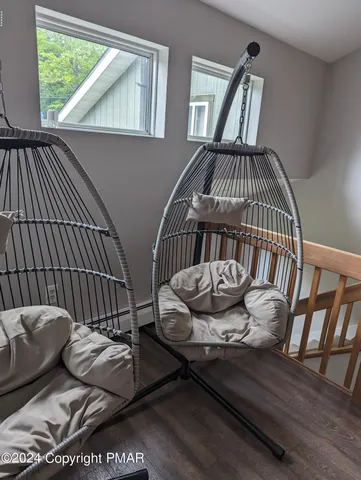 a view of staircase with wooden floor