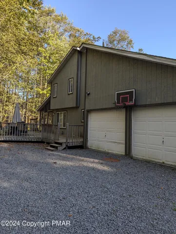 a view of a house with a garage