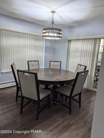 a view of a dining room with furniture