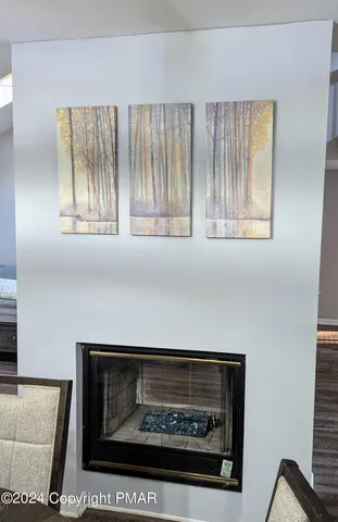 a closeup of a fireplace with a window