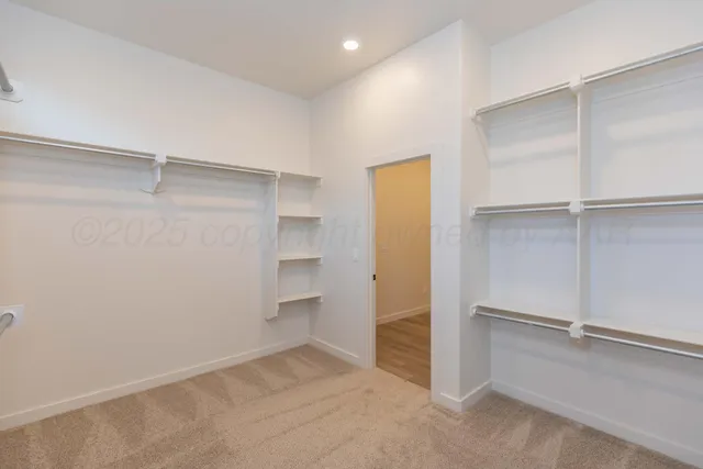 a kitchen with a sink and refrigerator