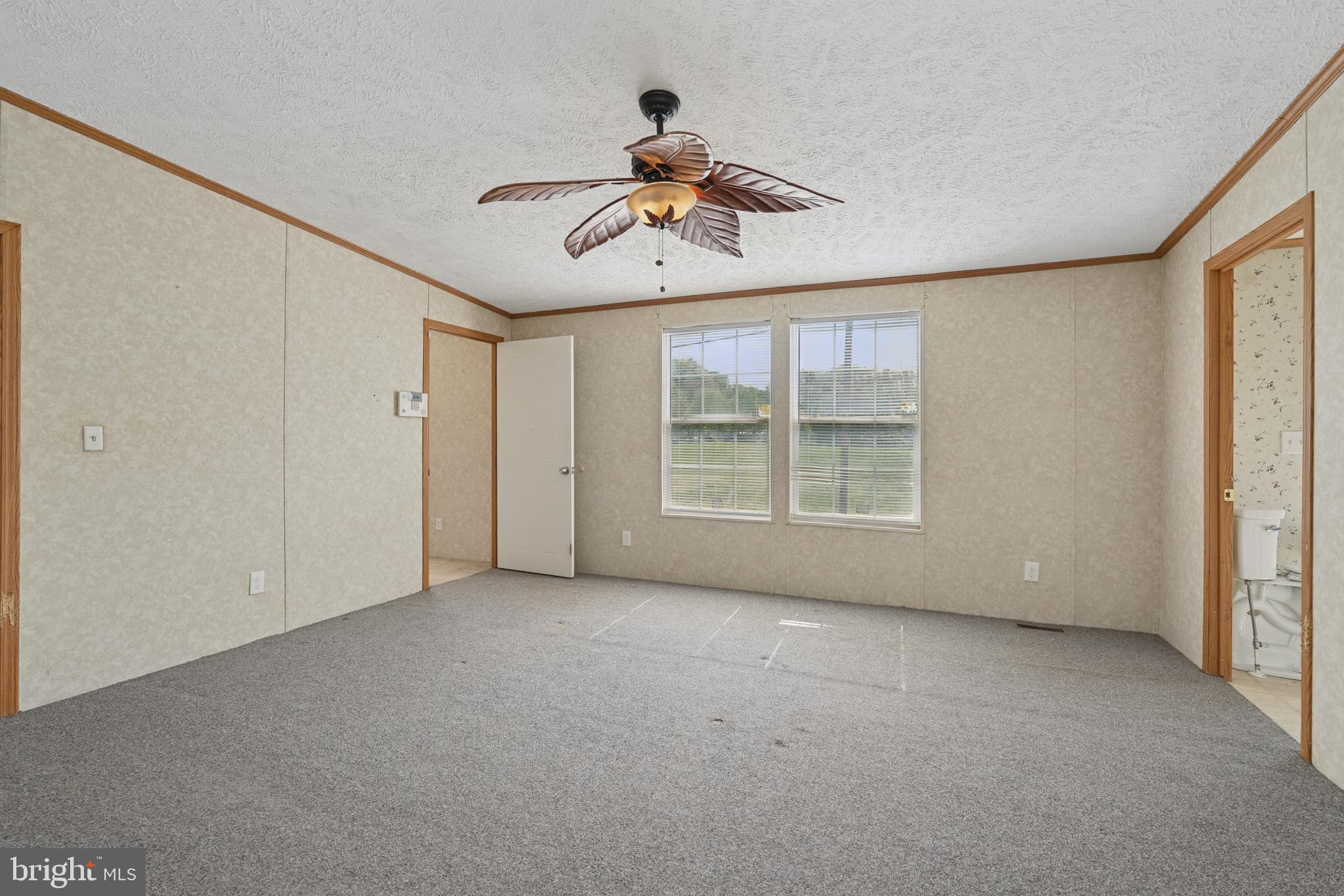 41 North Dragon Drive Bear, DE 19701 - Photo 14 of 30 a view of an empty room with windows