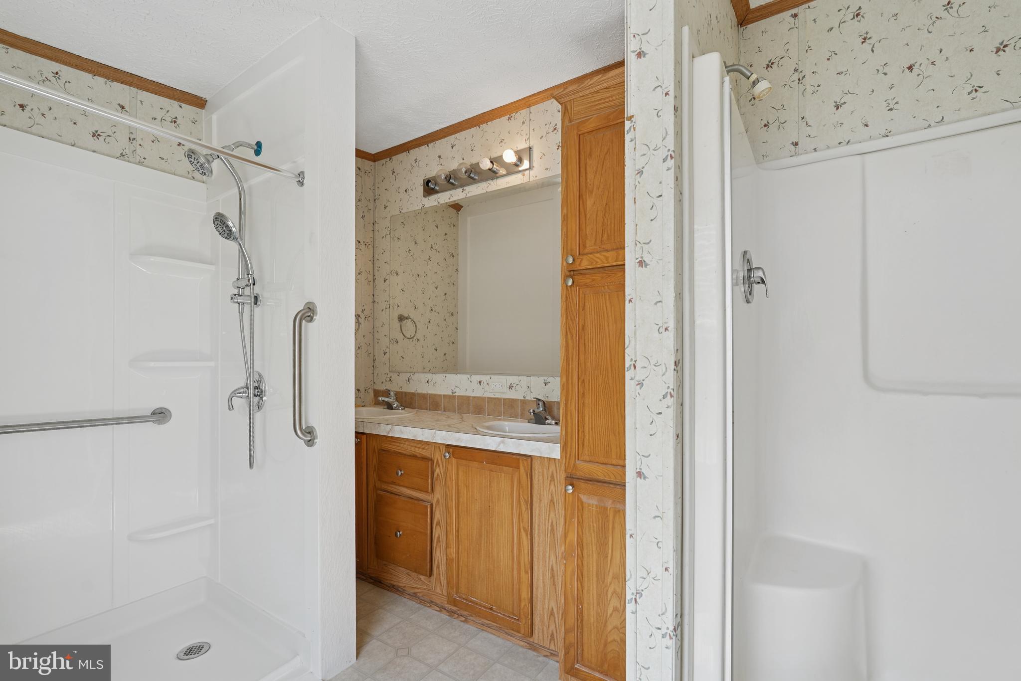 41 North Dragon Drive Bear, DE 19701 - Photo 17 of 30 a bathroom with a shower and a sink