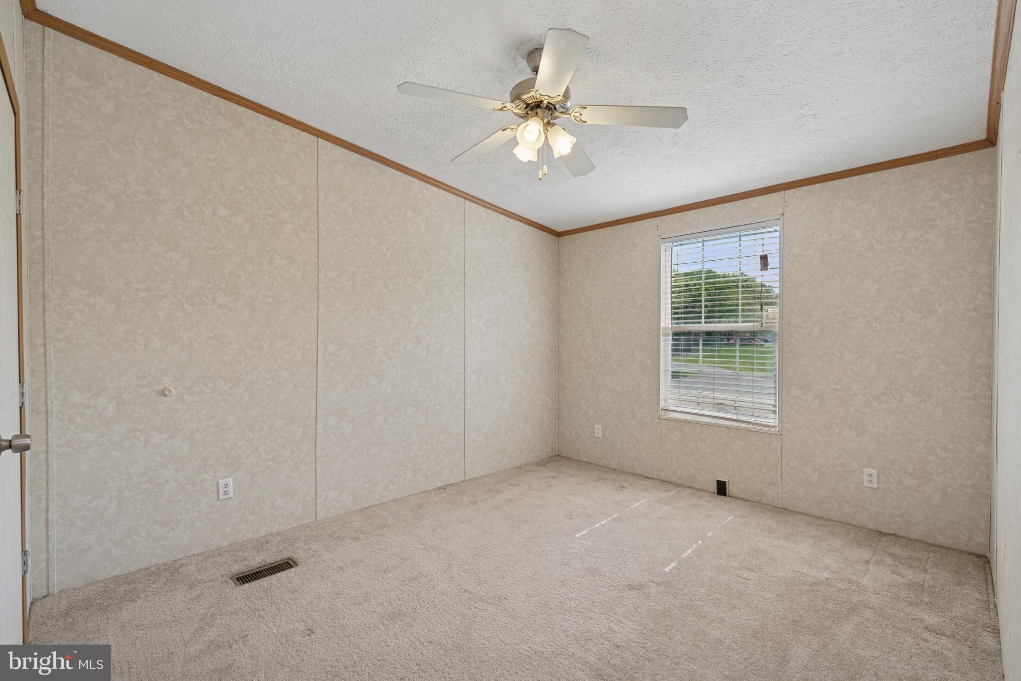 41 North Dragon Drive Bear, DE 19701 - Photo 20 of 30 a view of an empty room with a window