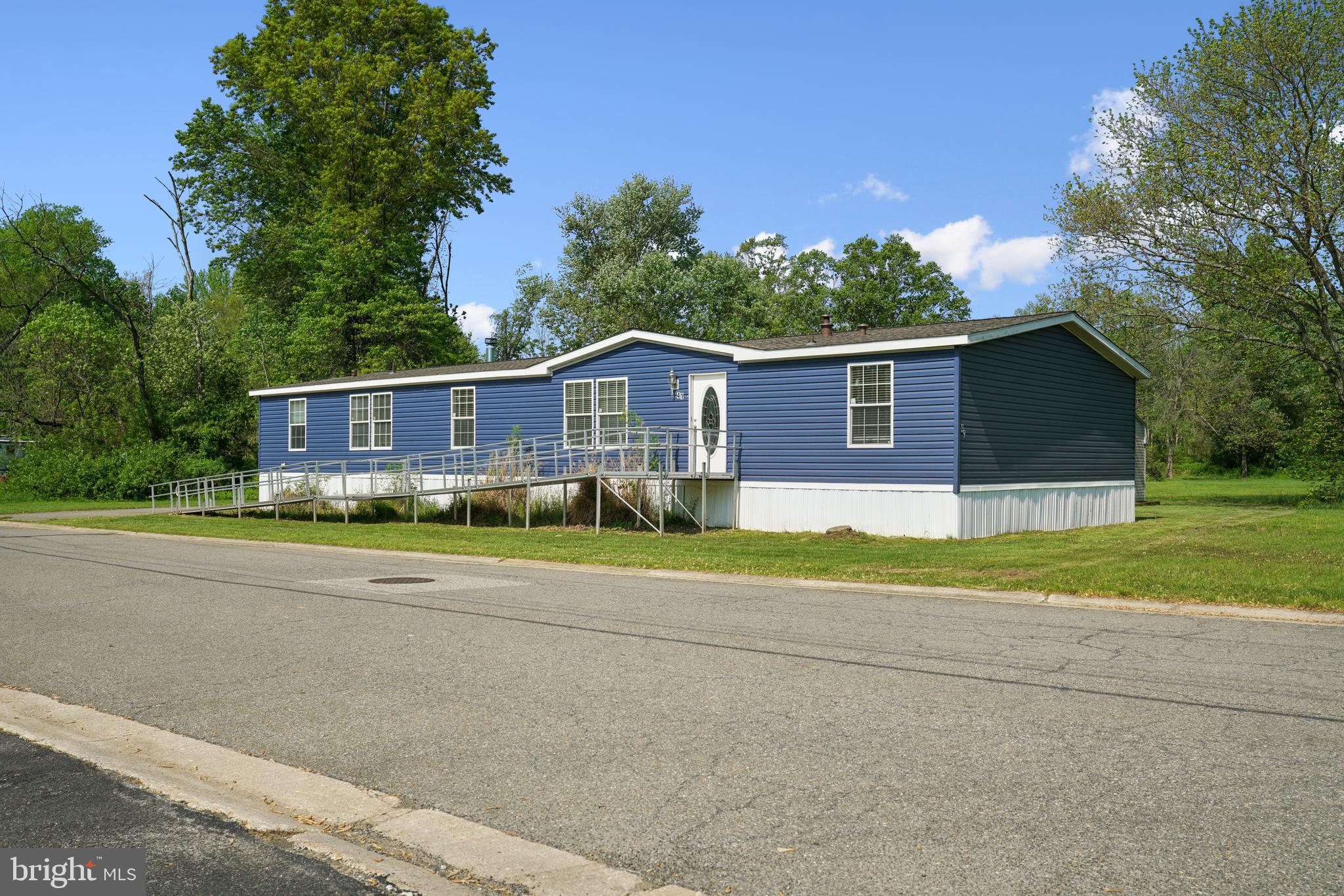 41 North Dragon Drive Bear, DE 19701 - Photo 3 of 30 a front view of house with yard and trees
