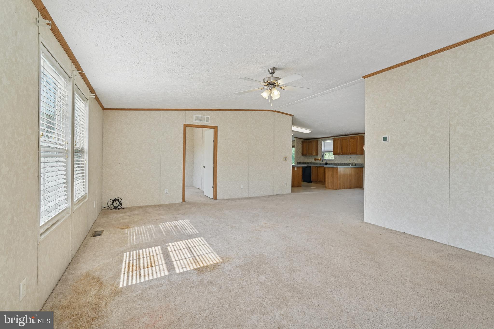 41 North Dragon Drive Bear, DE 19701 - Photo 5 of 30 wooden floor in an empty room with a window