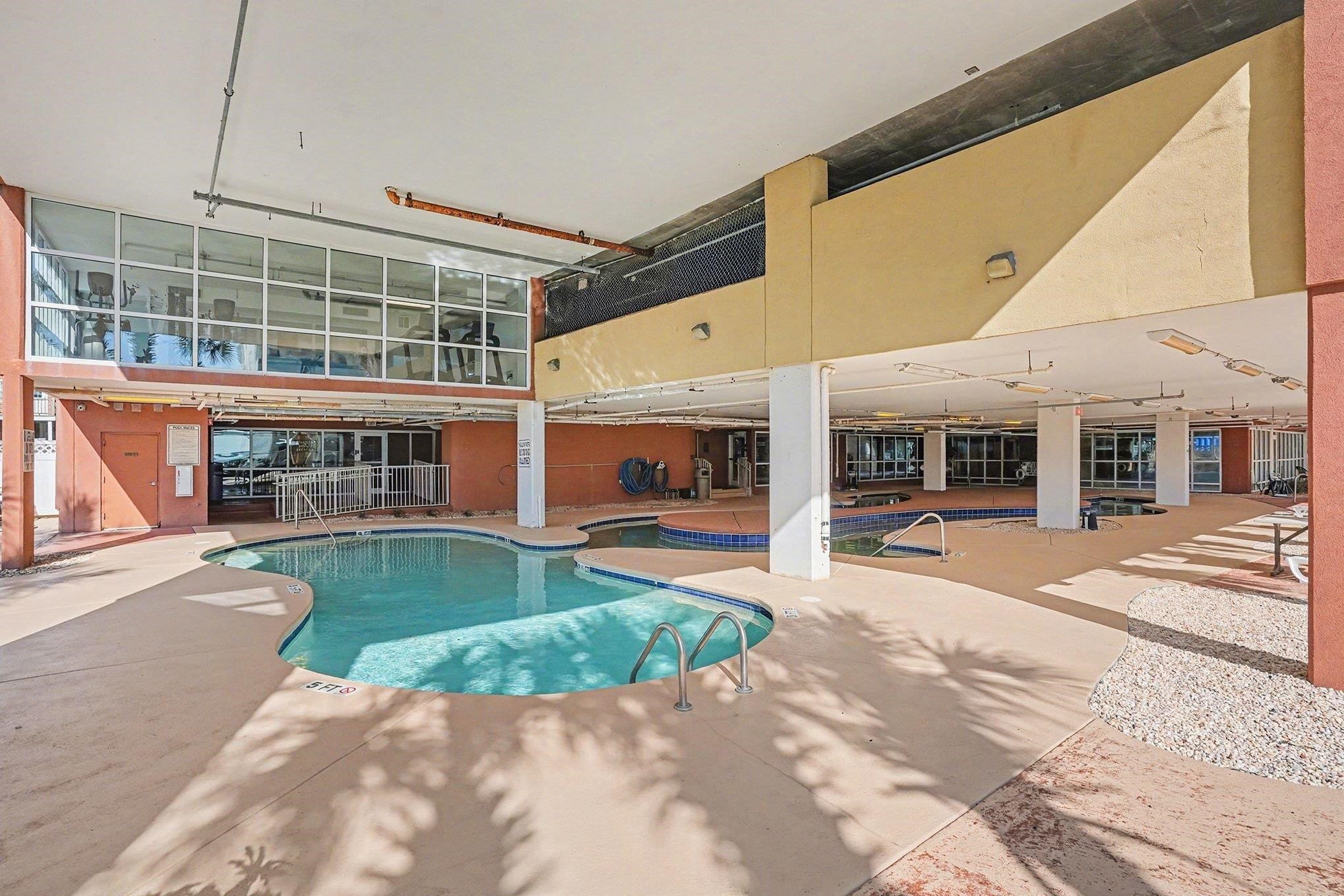 1707 Perrin Drive, Unit 606 North Myrtle Beach, SC 29582 - Photo 34 of 40 Community pool featuring a patio