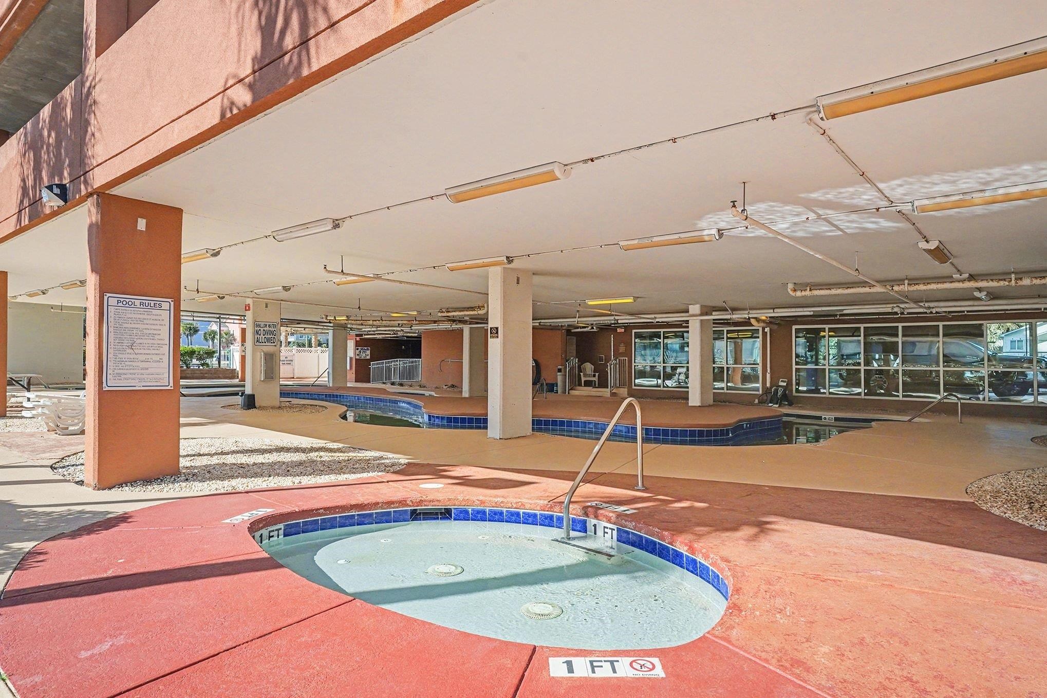 1707 Perrin Drive, Unit 606 North Myrtle Beach, SC 29582 - Photo 35 of 40 Community pool featuring a community hot tub