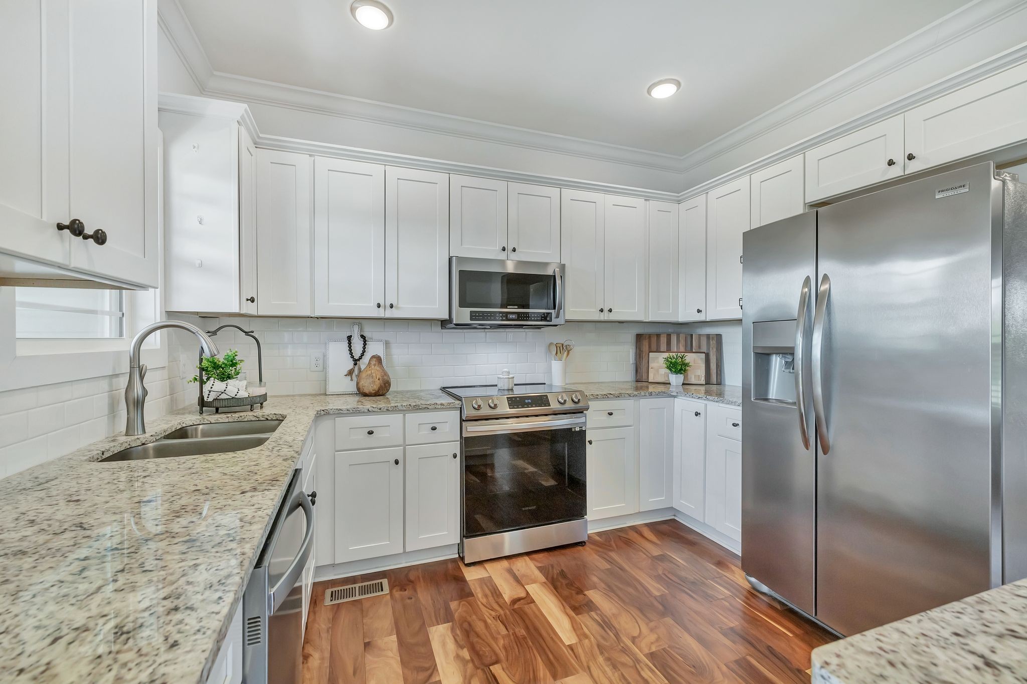 4711 Lunns Store Road Chapel Hill, TN 37034 - Photo 11 of 34 a kitchen with stainless steel appliances granite countertop a refrigerator sink and stove