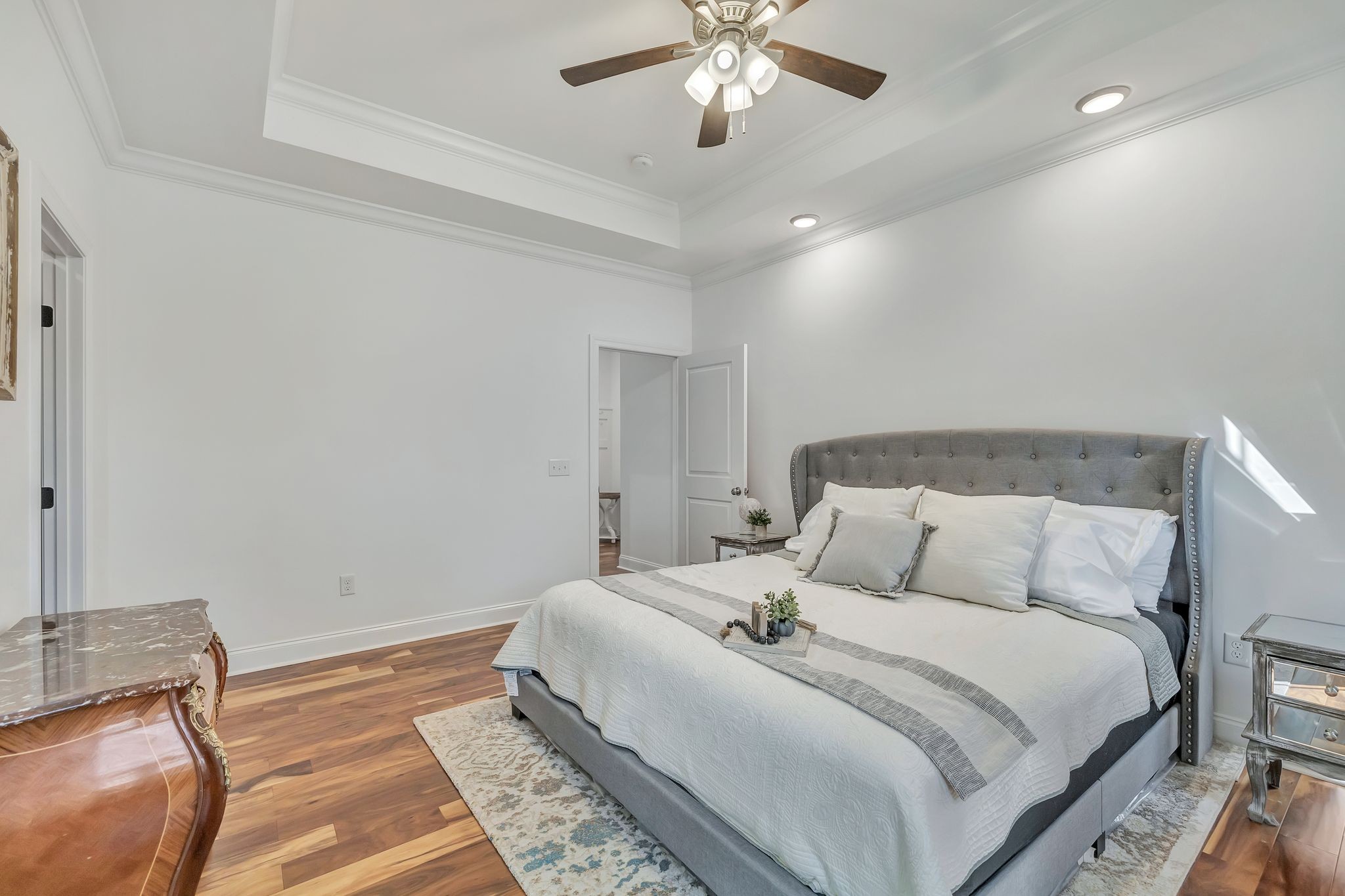 4711 Lunns Store Road Chapel Hill, TN 37034 - Photo 15 of 34 a bedroom with a large bed and a chandelier