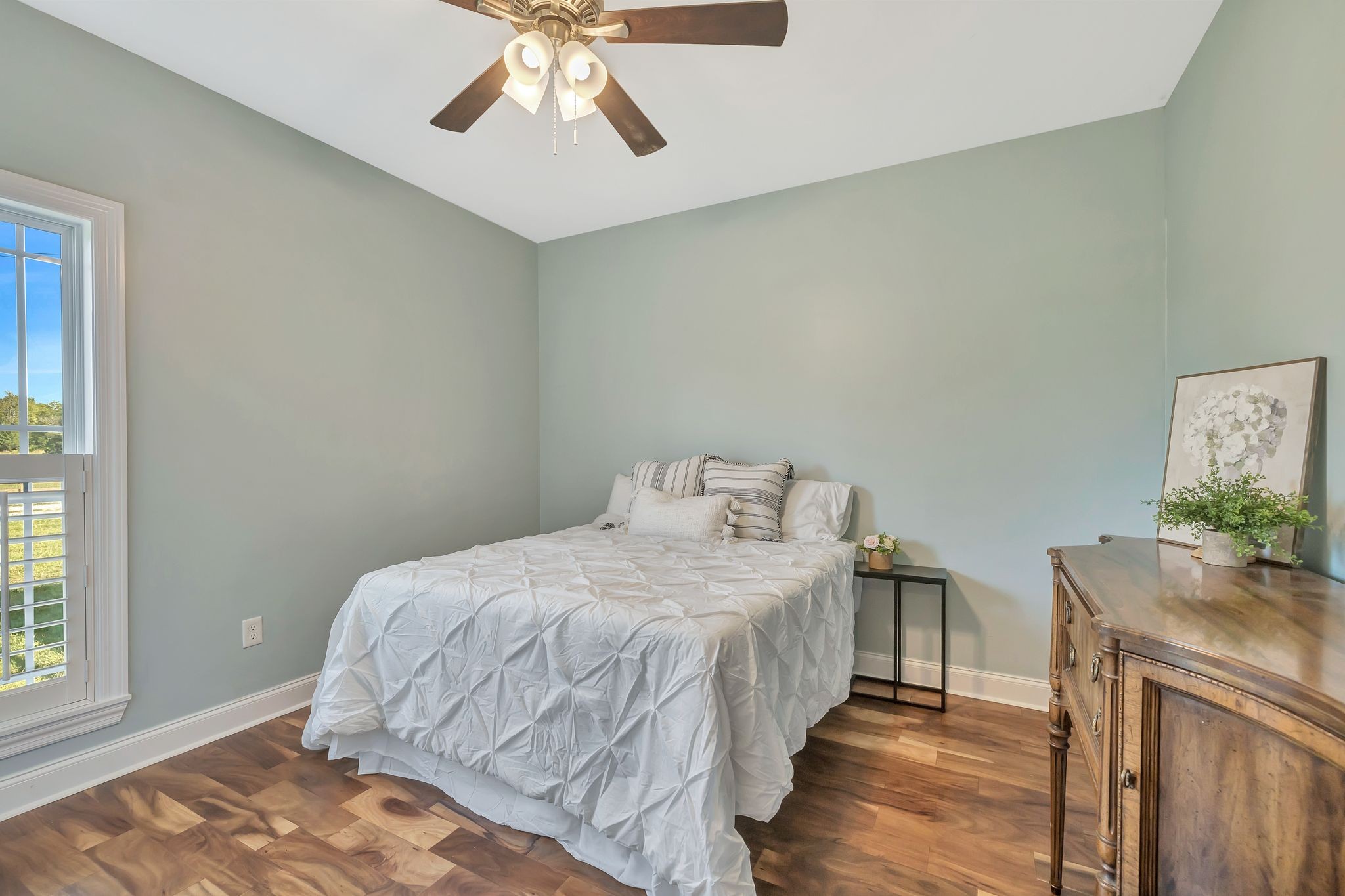 4711 Lunns Store Road Chapel Hill, TN 37034 - Photo 19 of 34 a bedroom with a bed and a chandelier