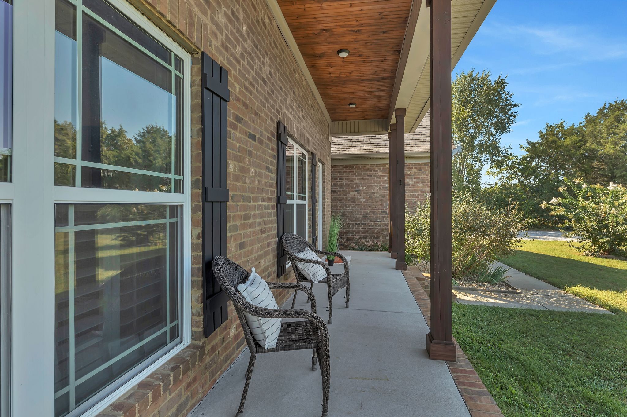 4711 Lunns Store Road Chapel Hill, TN 37034 - Photo 4 of 34 a patio with yard glass top table and chairs