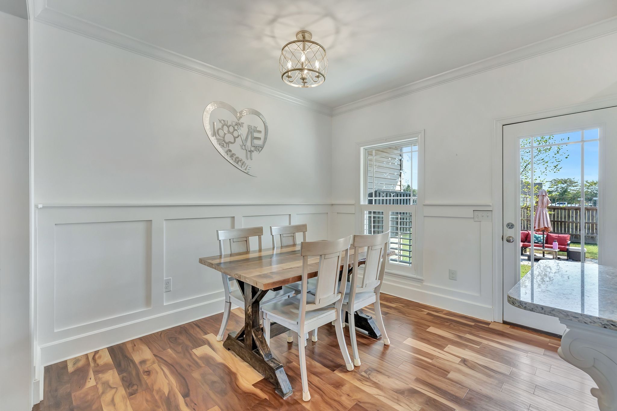 4711 Lunns Store Road Chapel Hill, TN 37034 - Photo 8 of 34 a view of a dining room with furniture wooden floor and a chandelier