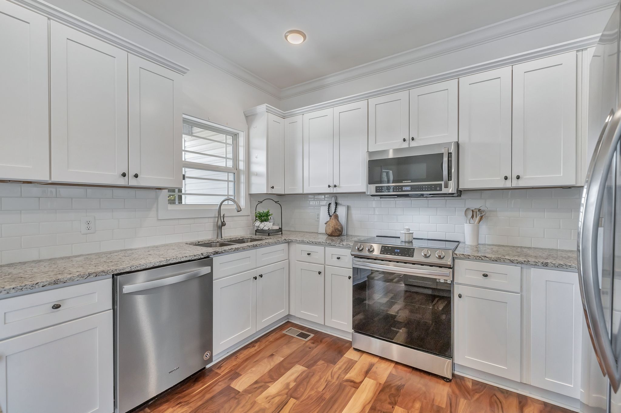 4711 Lunns Store Road Chapel Hill, TN 37034 - Photo 10 of 34 a kitchen with cabinets appliances a sink and a window