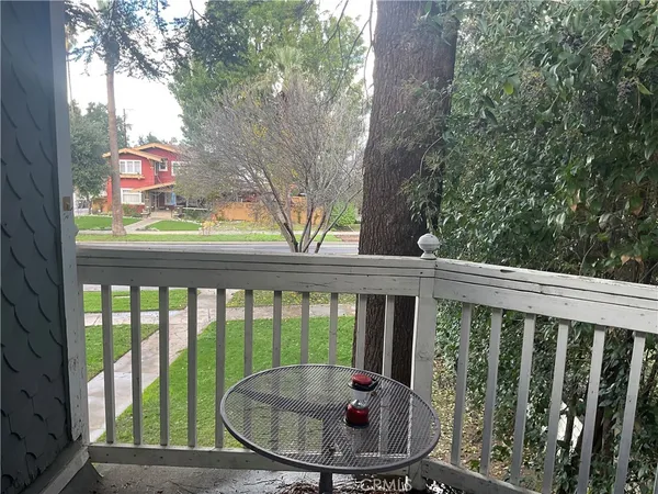 a view of a balcony with a swing
