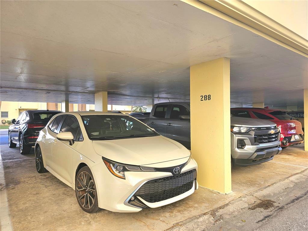 4525 Cove Circle, Unit 1002 St. Petersburg, FL 33708 - Photo 30 of 42 a view of parking garage