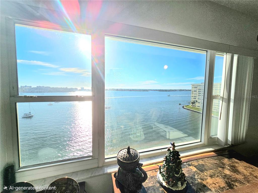4525 Cove Circle, Unit 1002 St. Petersburg, FL 33708 - Photo 5 of 42 a view of a glass door and windows