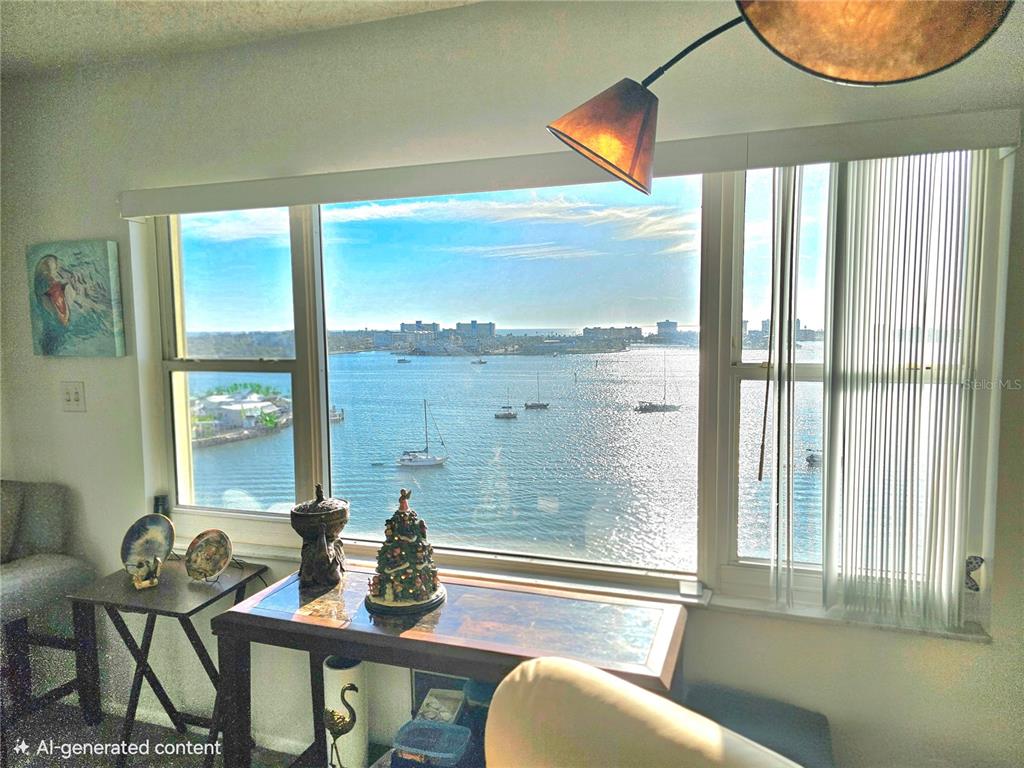 4525 Cove Circle, Unit 1002 St. Petersburg, FL 33708 - Photo 6 of 42 a bathroom with a sink mirror and a window
