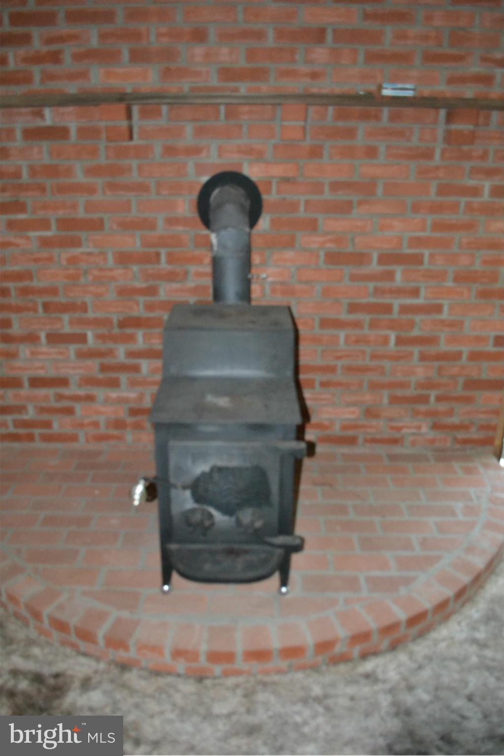 5851 Cari Road Huntingtown, MD 20639 - Photo 8 of 24 Wood Stove