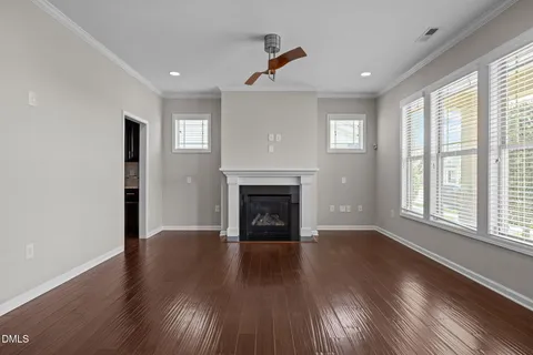 a view of an entryway with wooden floor