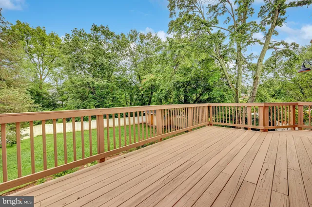 a view of wooden deck and a garden