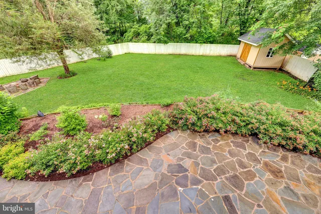 a view of a garden with a bench