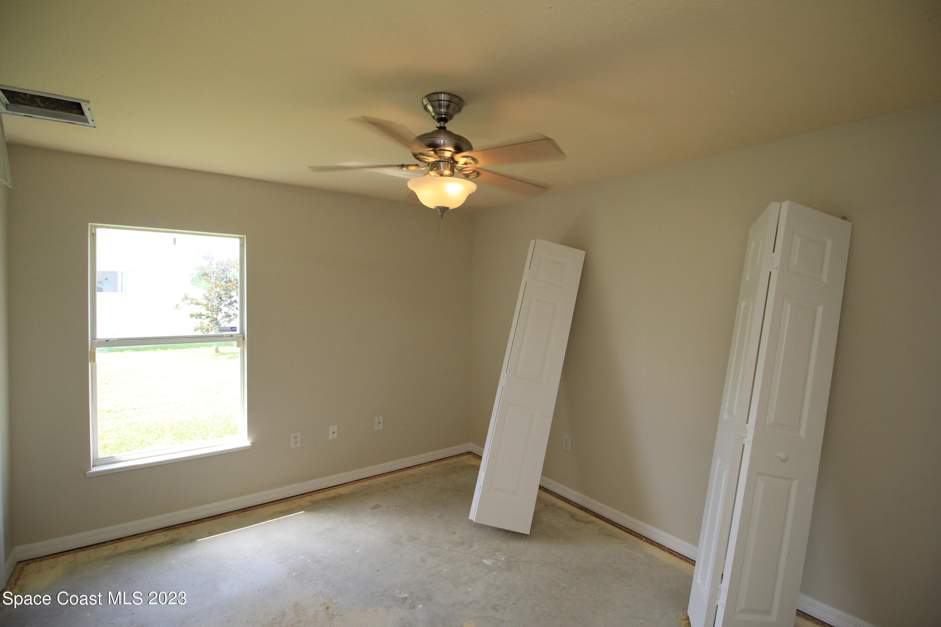 492 Eldron Boulevard Southeast Palm Bay, FL 32907 - Photo 22 of 28 a view of a room with a sink and a window