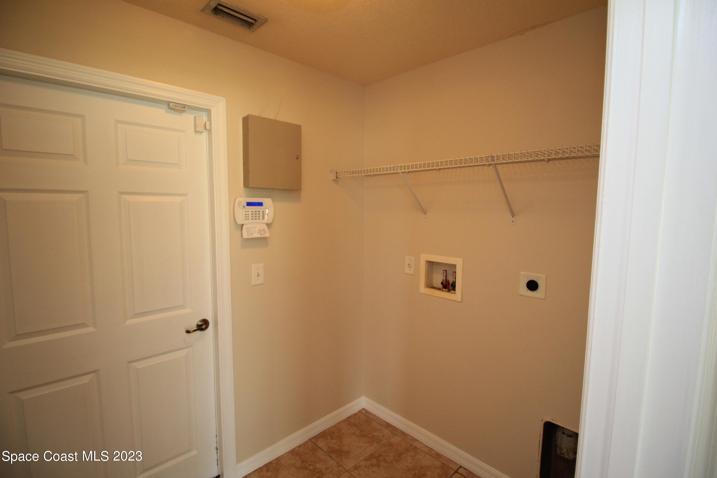 492 Eldron Boulevard Southeast Palm Bay, FL 32907 - Photo 24 of 28 a bathroom with a shower