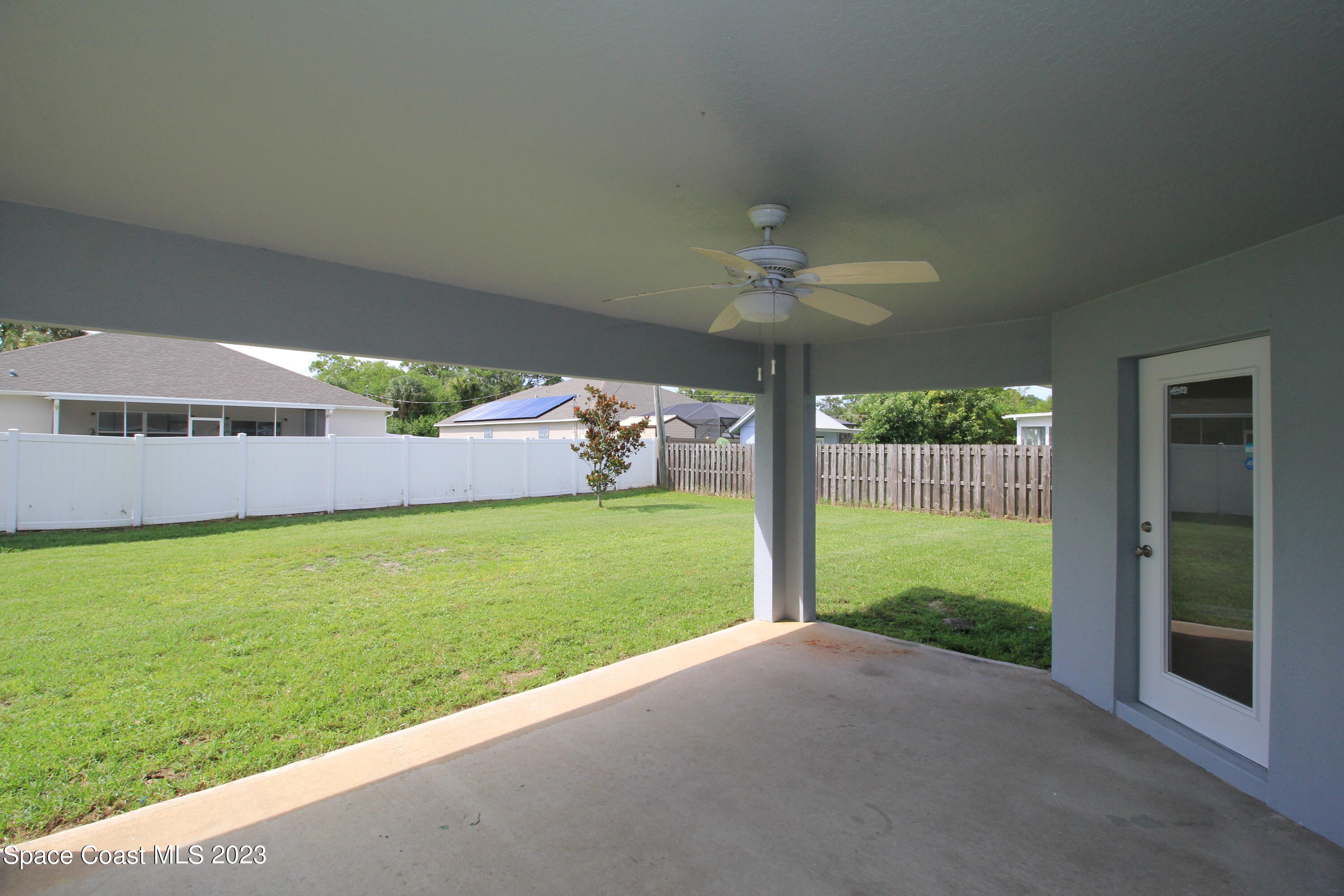 492 Eldron Boulevard Southeast Palm Bay, FL 32907 - Photo 6 of 28 a view of a porch and garden