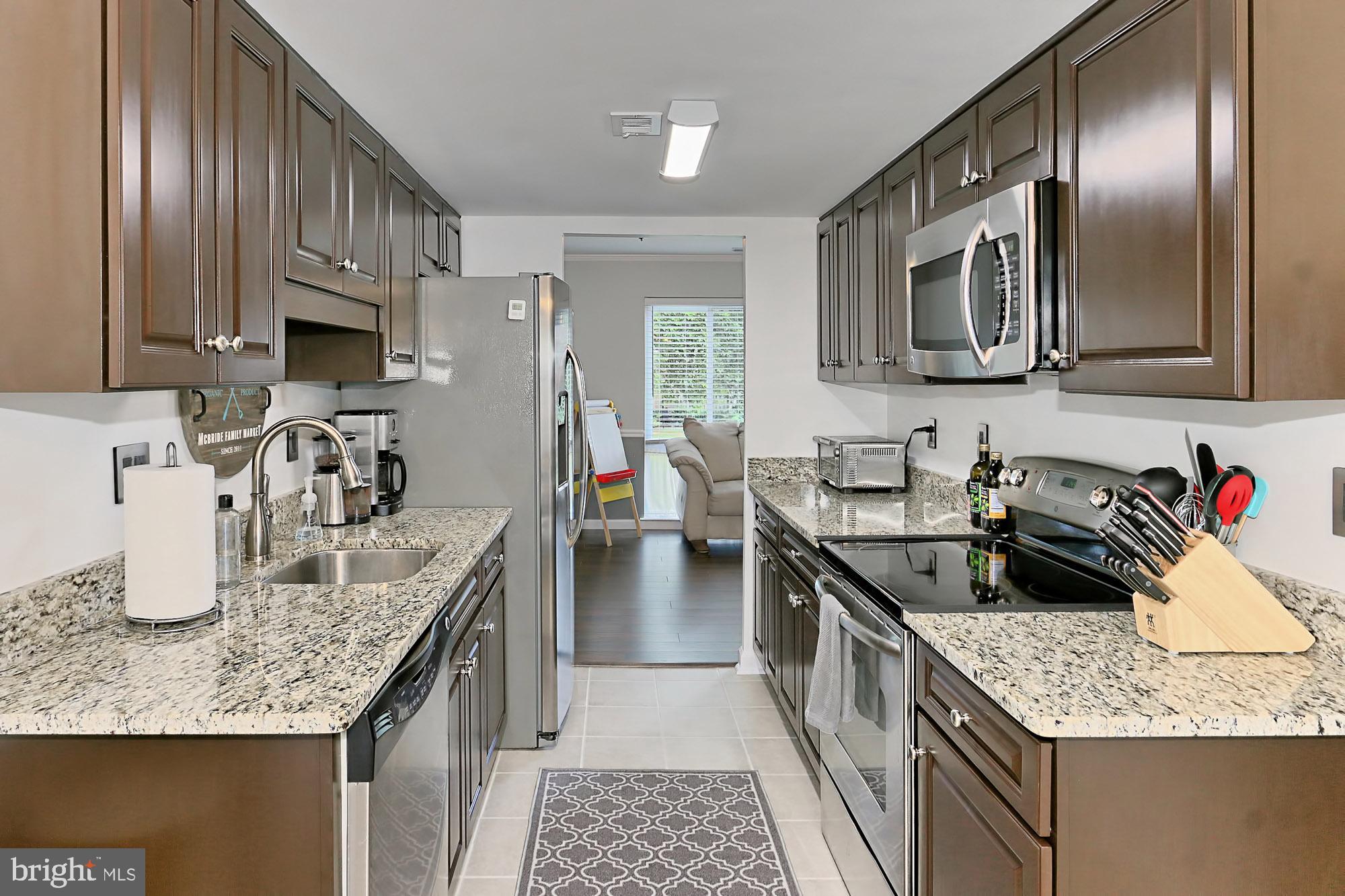 7936 Spring Forest Court Springfield, VA 22152 - Photo 1 of 40 Kitchen featuring ample cabinetry