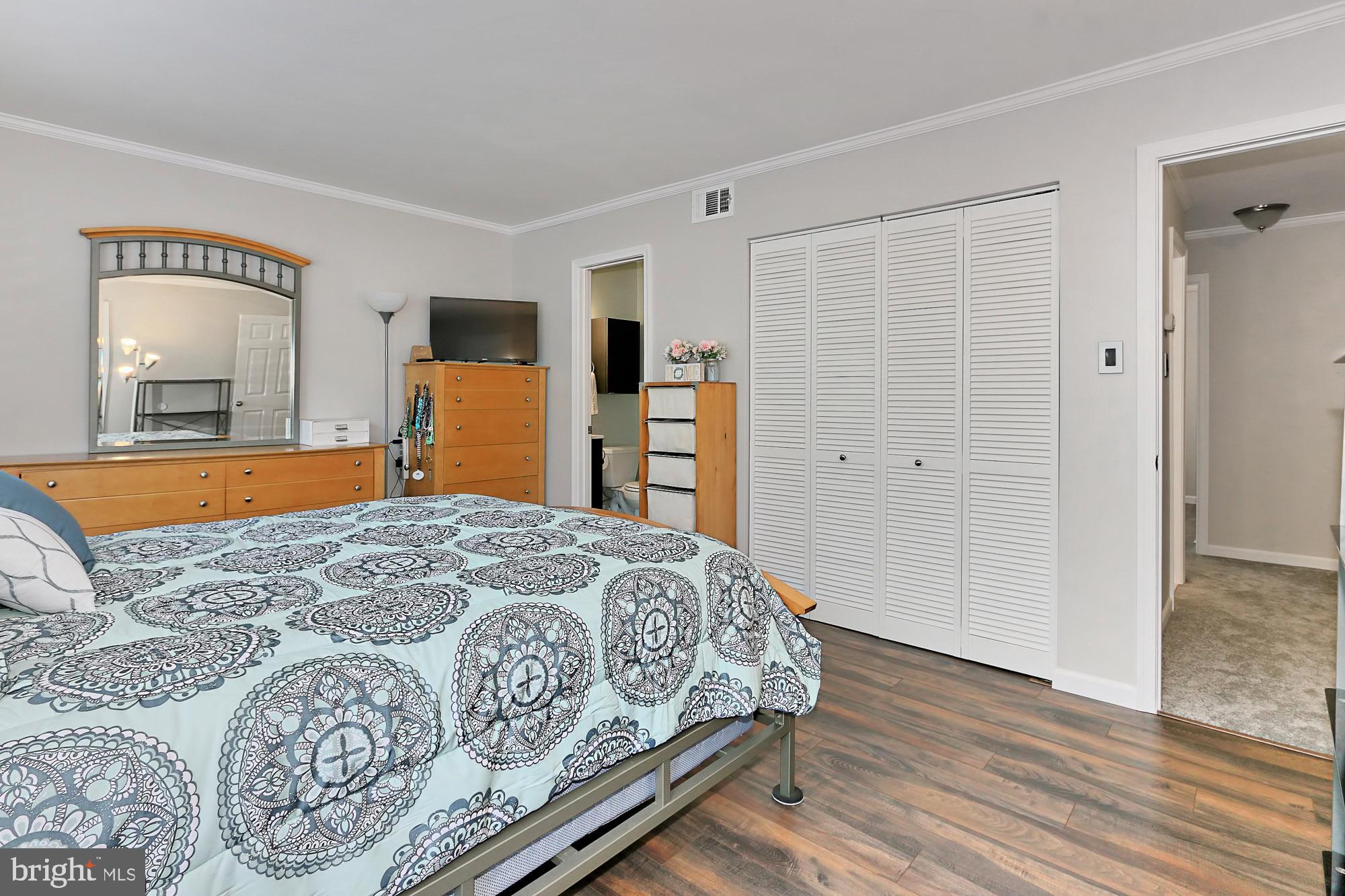 7936 Spring Forest Court Springfield, VA 22152 - Photo 23 of 40 Master bedroom closet features organization unit