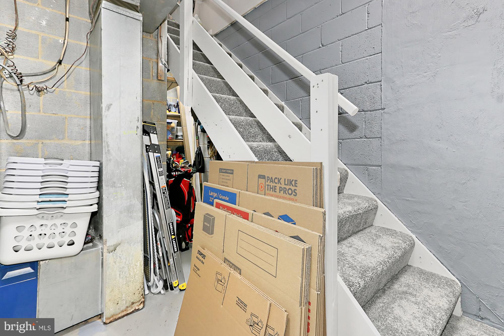 7936 Spring Forest Court Springfield, VA 22152 - Photo 31 of 40 New basement staircase and storage shelving