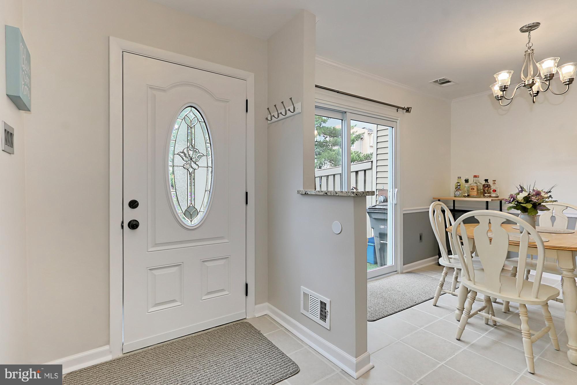 7936 Spring Forest Court Springfield, VA 22152 - Photo 5 of 40 Foyer with freshly painted door