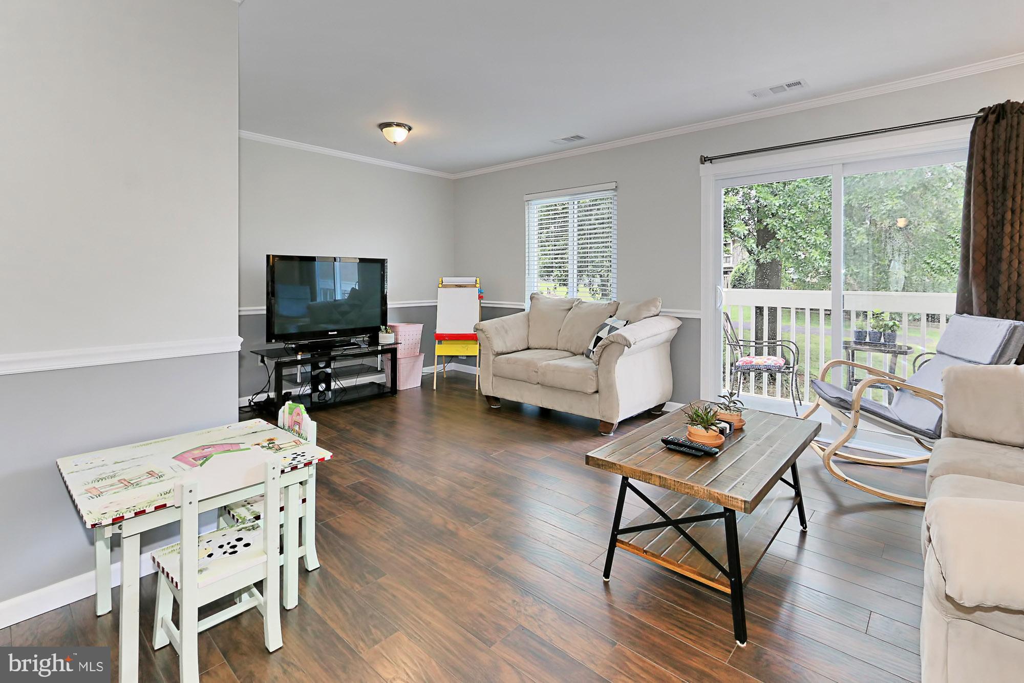 7936 Spring Forest Court Springfield, VA 22152 - Photo 6 of 40 Beautiful wood floors in the living space