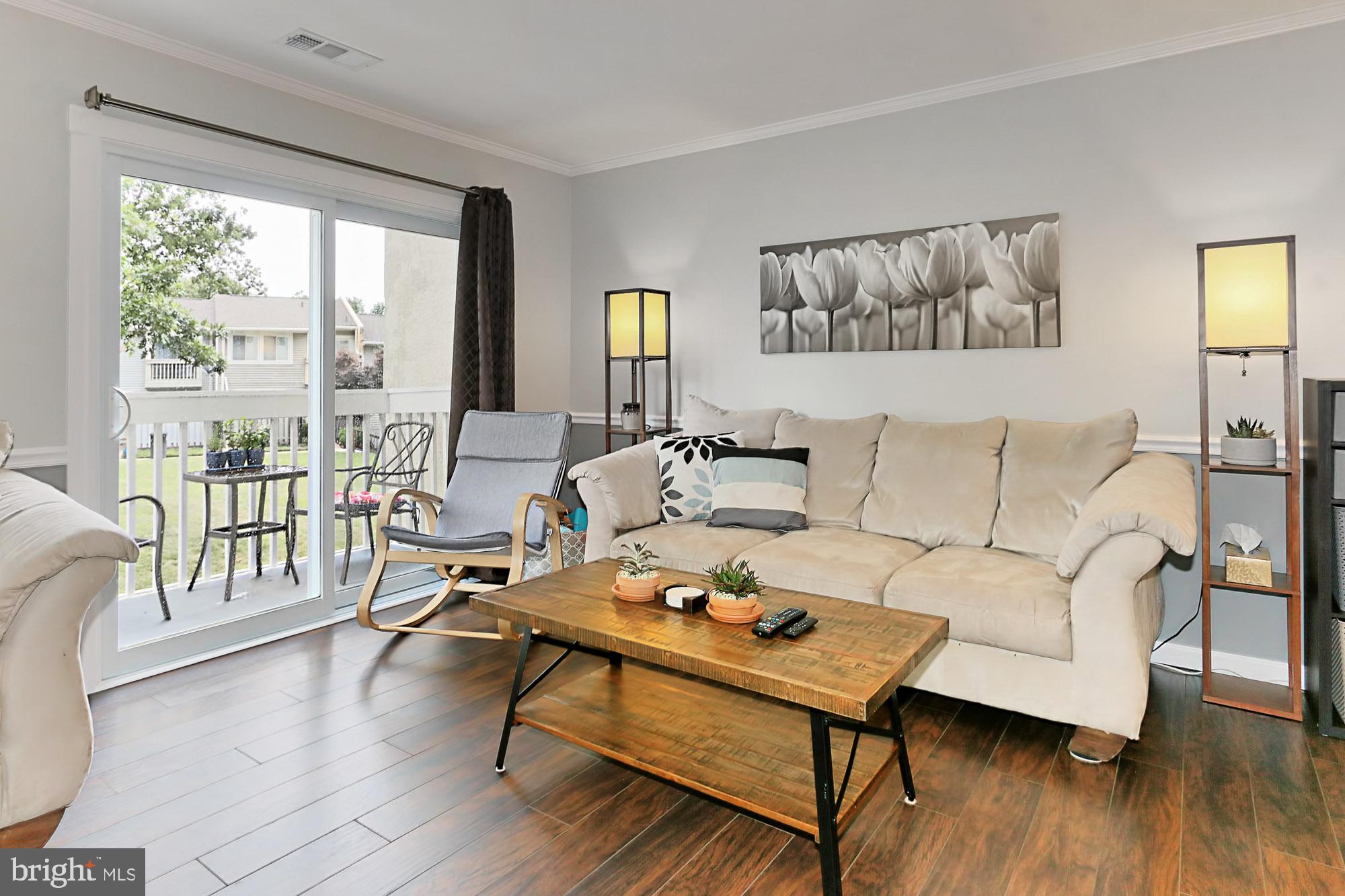 7936 Spring Forest Court Springfield, VA 22152 - Photo 8 of 40 Bright living room with natural light from patio