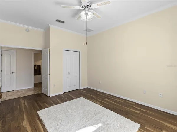 a view of a hallway with windows