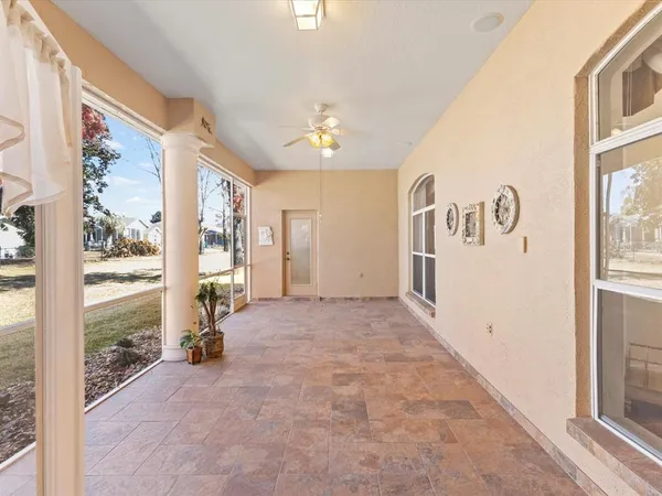 a utility room with cabinets washer and dryer