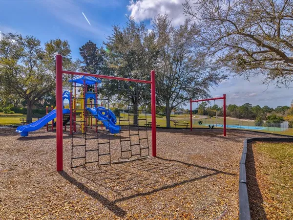 a view of swimming pool with a yard
