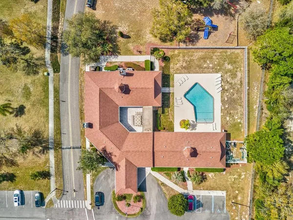 a backyard of a house with outdoor seating