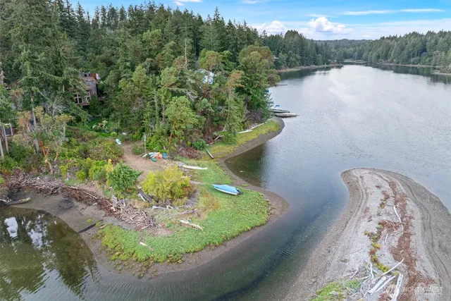 a view of a lake with a yard