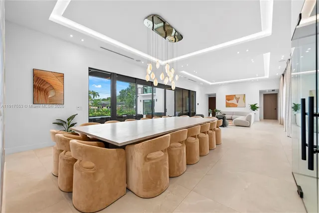 a view of a house with swimming pool and porch with furniture